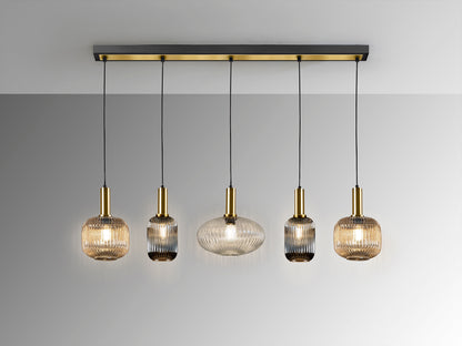 Lámpara Colgante Lineal Norma 5 Luces Negro Mate y Latón Schuller en ambiente decorado | Schuller