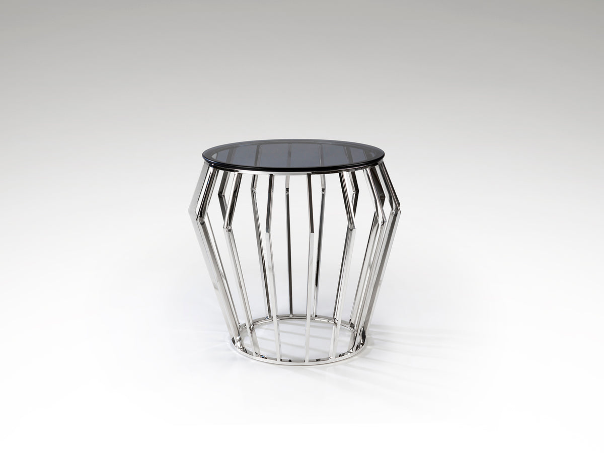 Mesa velador Ciros de acero brillo con cubierta de cristal smoke, ideal para dormitorio o salón. Diseño moderno y minimalista de Schuller (336710).